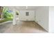 Covered car port featuring painted brick, concrete flooring, and ample open space at 4188 Fontana Ct, Atlanta, GA 30084