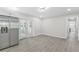 Open kitchen with stainless steel appliances, recessed lighting, and French doors to the porch at 4188 Fontana Ct, Tucker, GA 30084