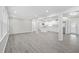 Spacious living room with bright recessed lighting opens to the kitchen area at 4188 Fontana Ct, Atlanta, GA 30084