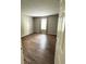 Bedroom featuring wood floors, neutral walls and natural light at 2107 Augusta Se Dr, Marietta, GA 30067