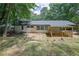 Exterior of the home showing backyard and screened porch at 2991 Catalina Dr, Decatur, GA 30032