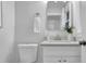Modern bathroom featuring a quartz countertop, updated fixtures, and neutral decor at 2991 Catalina Dr, Decatur, GA 30032
