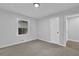Clean, carpeted room with ample light and closet space at 2991 Catalina Dr, Decatur, GA 30032