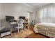 Bedroom with a workspace, natural light, and neutral decor at 3777 Peachtree Ne Rd # 1112, Brookhaven, GA 30319