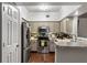 A kitchen boasts stainless steel appliances and ample cabinet space at 3777 Peachtree Ne Rd # 1112, Brookhaven, GA 30319