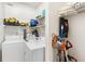 Laundry room featuring washer, dryer, storage shelves, and cleaning equipment at 3777 Peachtree Ne Rd # 1112, Brookhaven, GA 30319