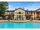 Resort-style pool with lounge chairs and manicured landscaping, perfect for relaxation and recreation at 3777 Peachtree Ne Rd # 1112, Brookhaven, GA 30319