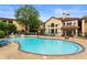 Large pool area with seating and water feature in a well-maintained community setting at 3777 Peachtree Ne Rd # 1112, Brookhaven, GA 30319