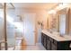 Well-appointed bathroom features double sinks, a shower, and modern fixtures at 6298 Pierless Ave, Sugar Hill, GA 30518