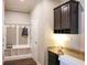 Convenient mudroom with built-in storage, hooks for coats, and a granite countertop desk area at 6298 Pierless Ave, Sugar Hill, GA 30518