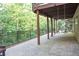 Enjoy the outdoors on this covered patio with brick flooring at 6298 Pierless Ave, Sugar Hill, GA 30518