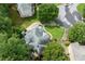 Captivating aerial view of the home, revealing its beautifully landscaped yard and peaceful neighborhood setting at 2015 Samuel Close Ct, Alpharetta, GA 30009