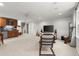 Spacious basement featuring a wet bar, recessed lighting, and ample seating for entertaining guests at 2015 Samuel Close Ct, Alpharetta, GA 30009