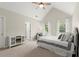 Bedroom featuring large windows, ceiling fan, and white dresser at 2015 Samuel Close Ct, Alpharetta, GA 30009