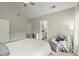 Bedroom featuring large windows, ceiling fan, and striped chair at 2015 Samuel Close Ct, Alpharetta, GA 30009