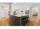 Spacious kitchen with a large center island with seating and stainless steel appliances at 2015 Samuel Close Ct, Alpharetta, GA 30009