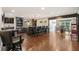 Finished basement with a bar, pool table, and ample seating at 407 Maple Ridge Ct, Cumming, GA 30028
