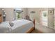 Cozy bedroom featuring a large window and comfortable furnishings at 407 Maple Ridge Ct, Cumming, GA 30028