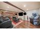 Enjoyable theater room with leather chairs and a fun arcade game at 407 Maple Ridge Ct, Cumming, GA 30028