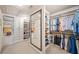 Large walk-in closet with custom built-ins, providing plenty of storage for clothes and accessories at 407 Maple Ridge Ct, Cumming, GA 30028