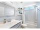 Bathroom with modern sink vanity, framed mirror, and tub with shower combo and decorative shelving at 1945 Barrett Dr, Cumming, GA 30040