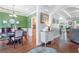 Bright living area showcasing hardwood floors, soft lighting, and an open floor plan at 1945 Barrett Dr, Cumming, GA 30040