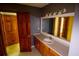 Bathroom with vanity and large mirror reflecting multiple entry points at 20 Lisa Ct, Stockbridge, GA 30281