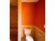 Tiled bathroom features a toilet and a tiled shower with a built-in bench at 20 Lisa Ct, Stockbridge, GA 30281