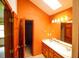 Bathroom featuring double sinks, an extended vanity, and ample lighting at 20 Lisa Ct, Stockbridge, GA 30281