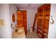 Functional bathroom with patterned floors, cabinets, and a standing mirror at 20 Lisa Ct, Stockbridge, GA 30281
