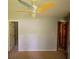 Bedroom with ceiling fan, neutral walls and door to connecting room at 20 Lisa Ct, Stockbridge, GA 30281