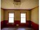 Dining room with two windows and red and tan walls at 20 Lisa Ct, Stockbridge, GA 30281