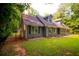 Charming single-Gathering home featuring stone accents, and a well-maintained front yard at 20 Lisa Ct, Stockbridge, GA 30281