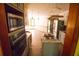 Kitchen with stainless steel appliances, including a microwave, and eat in breakfast area at 20 Lisa Ct, Stockbridge, GA 30281