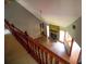 Living room with vaulted ceilings, wood floors, and a stone fireplace at 20 Lisa Ct, Stockbridge, GA 30281