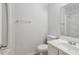 Clean bathroom with a vanity, sink, toilet, and a shower/bath combo at 310 Wolf Downs Way, Atlanta, GA 30349