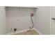 Laundry room with tile floors and washer hookups at 310 Wolf Downs Way, Atlanta, GA 30349