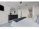 Bedroom with dark furniture, tray ceilings, and a walk-in closet at 3630 Peachtree Ne Rd # 2408, Atlanta, GA 30326