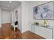 Elegant entryway with hardwood floors, a stylish console table, and tasteful decor for a welcoming ambiance at 3630 Peachtree Ne Rd # 2408, Atlanta, GA 30326