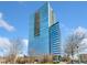Modern high-rise building with sleek architecture and expansive windows offering cityscape views and natural light at 3630 Peachtree Ne Rd # 2408, Atlanta, GA 30326