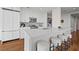 Bright, well-appointed kitchen with a large island, modern appliances, and a view of the condo's entryway at 3630 Peachtree Ne Rd # 2408, Atlanta, GA 30326