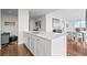 Spacious kitchen with a large island, white countertops, modern fixtures, and an adjacent dining area at 3630 Peachtree Ne Rd # 2408, Atlanta, GA 30326