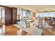 An elegant living room with hardwood floors, large windows with cityscape views, and stylish furniture at 3630 Peachtree Ne Rd # 2408, Atlanta, GA 30326