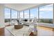 Open concept living room with hardwood floors and expansive city view at 3630 Peachtree Ne Rd # 2408, Atlanta, GA 30326