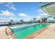 A rooftop pool with lounge chairs and stunning city views, providing a luxurious amenity for residents at 3630 Peachtree Ne Rd # 2408, Atlanta, GA 30326