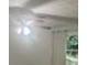 Bright bedroom with ceiling fan and natural light from the nearby window at 3785 Somerset Sw Dr, Marietta, GA 30064