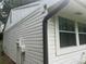 Exterior with contrasting gutters and horizontal siding at 3785 Somerset Sw Dr, Marietta, GA 30064