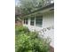 Well-maintained home exterior featuring manicured landscaping and multiple windows at 3785 Somerset Sw Dr, Marietta, GA 30064