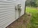 Exterior home utility box, horizontal siding, and close cropped yard at 3785 Somerset Sw Dr, Marietta, GA 30064