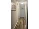Long hallway with hardwood floors and recessed lighting at 3785 Somerset Sw Dr, Marietta, GA 30064